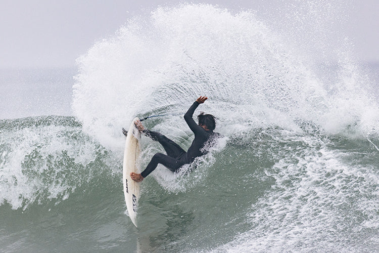 Zeke Lau surfing in the Comp+ fullsuit