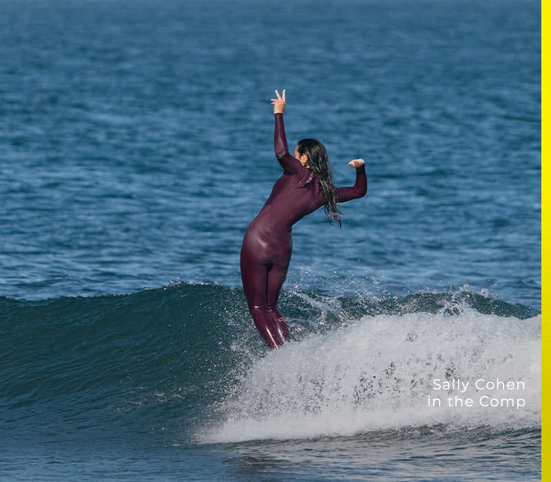 Sally Cohen riding a wave