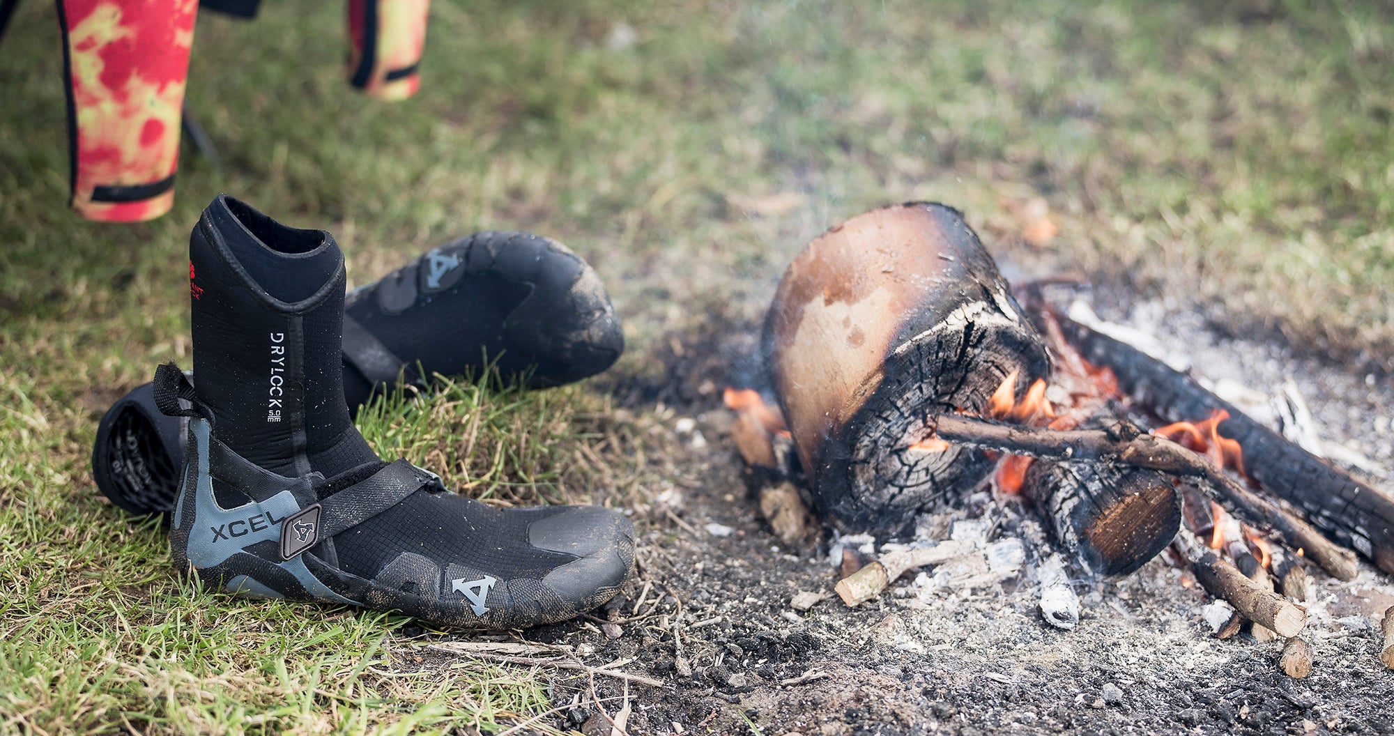 Xcel Drylock Boots drying in front of a fire